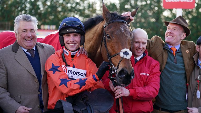 Trainer Paul Nicholls (left), Jockey Harry Cobden (centre left) and owner Bryan Drew (second right) celebrate winning The Ladbrokes King George VI Chase ridden by Bravemansgame during day one of the Ladbrokes Christmas Festival at Kempton 