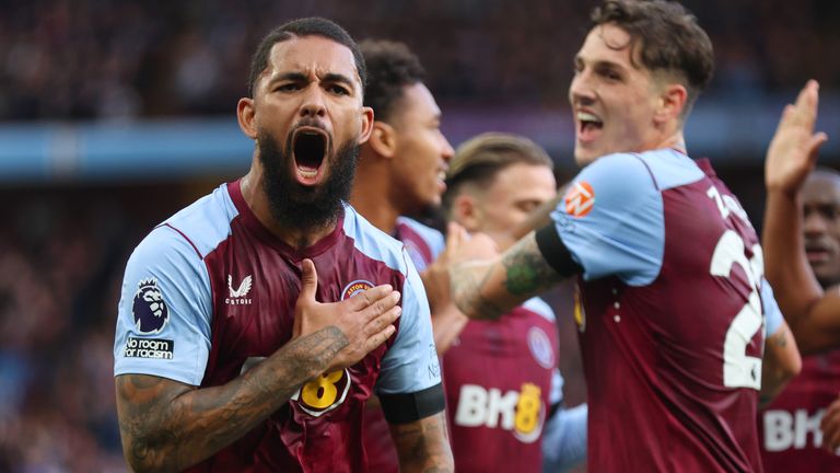 Douglas Luiz celebrates his opener against West Ham