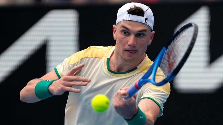 Jack Draper plays a forehand return to Tommy Paul during their second-round match at the Australian Open