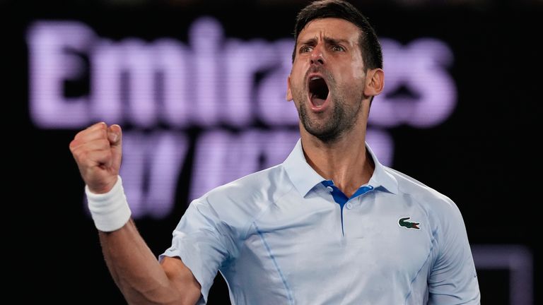 Serbia&#39;s Novak Djokovic celebrates after winning the third set against Croatia&#39;s Dino Prizmic during their first round match at the Australian Open tennis championships at Melbourne Park, Melbourne, Australia, Sunday, Jan. 14, 2024. (AP Photo/Andy Wong)